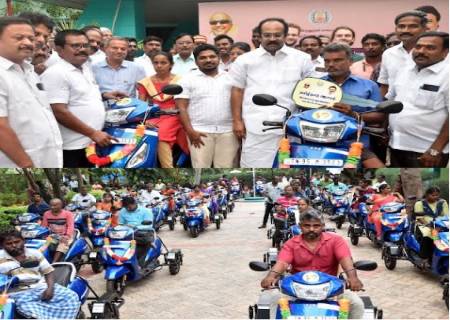 மாற்றுத்திறனாளிகளுக்கு தலா ரூ.1,06,000- வீதம் மொத்தம் ரூ.90.10 இலட்சம்  மதிப்பிலான இணைப்பு சக்கரம் பொருத்தப்பட்ட மோட்டார் இருசக்கர வாகனங்கள் வழங்கப்பட்டுள்ளன.